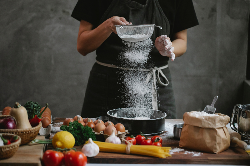 A Girl making food of Italian Cuisine