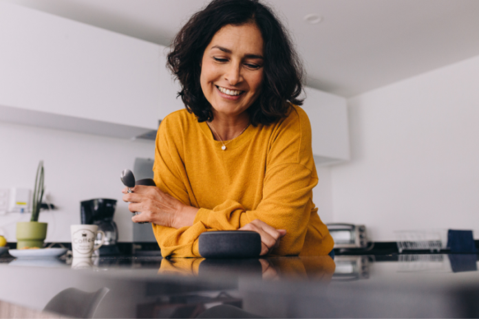 A lady is watching home gadgets