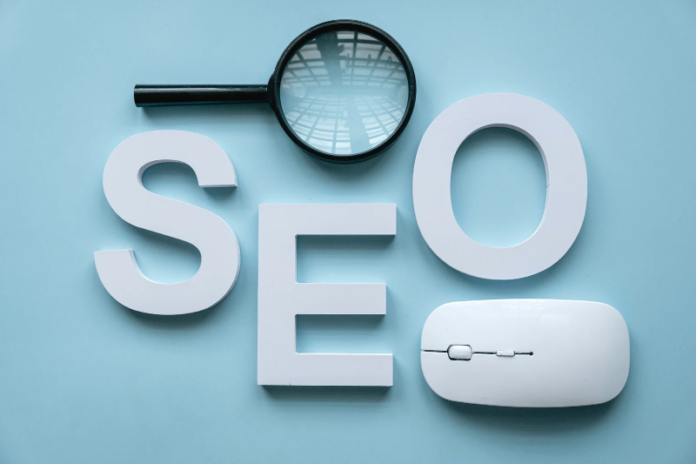 Seo written on board with mouse