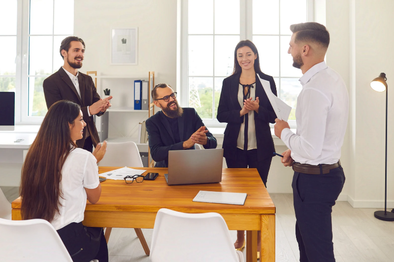 Office colleagues talking with respect 