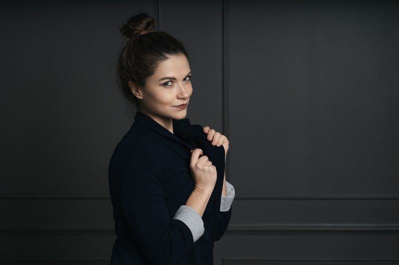 A girl is wearing black dress